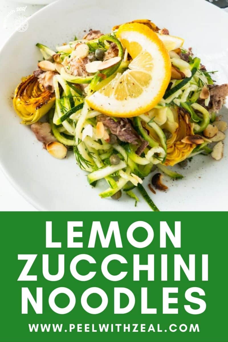 Lemon zucchini noodles in bowl with almonds.