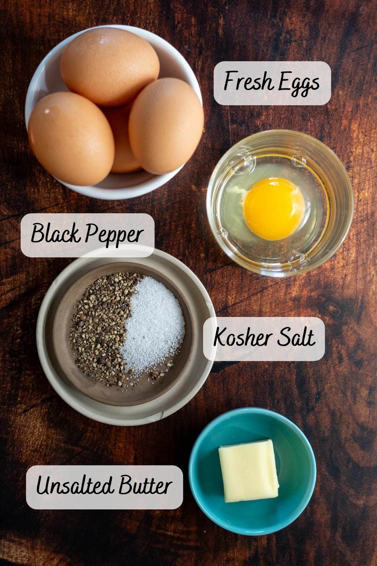 Ingredients needed for frying eggs on a table.