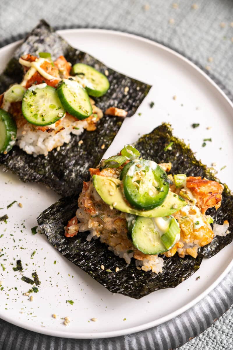 Salmon Sushi bites on nori squares.