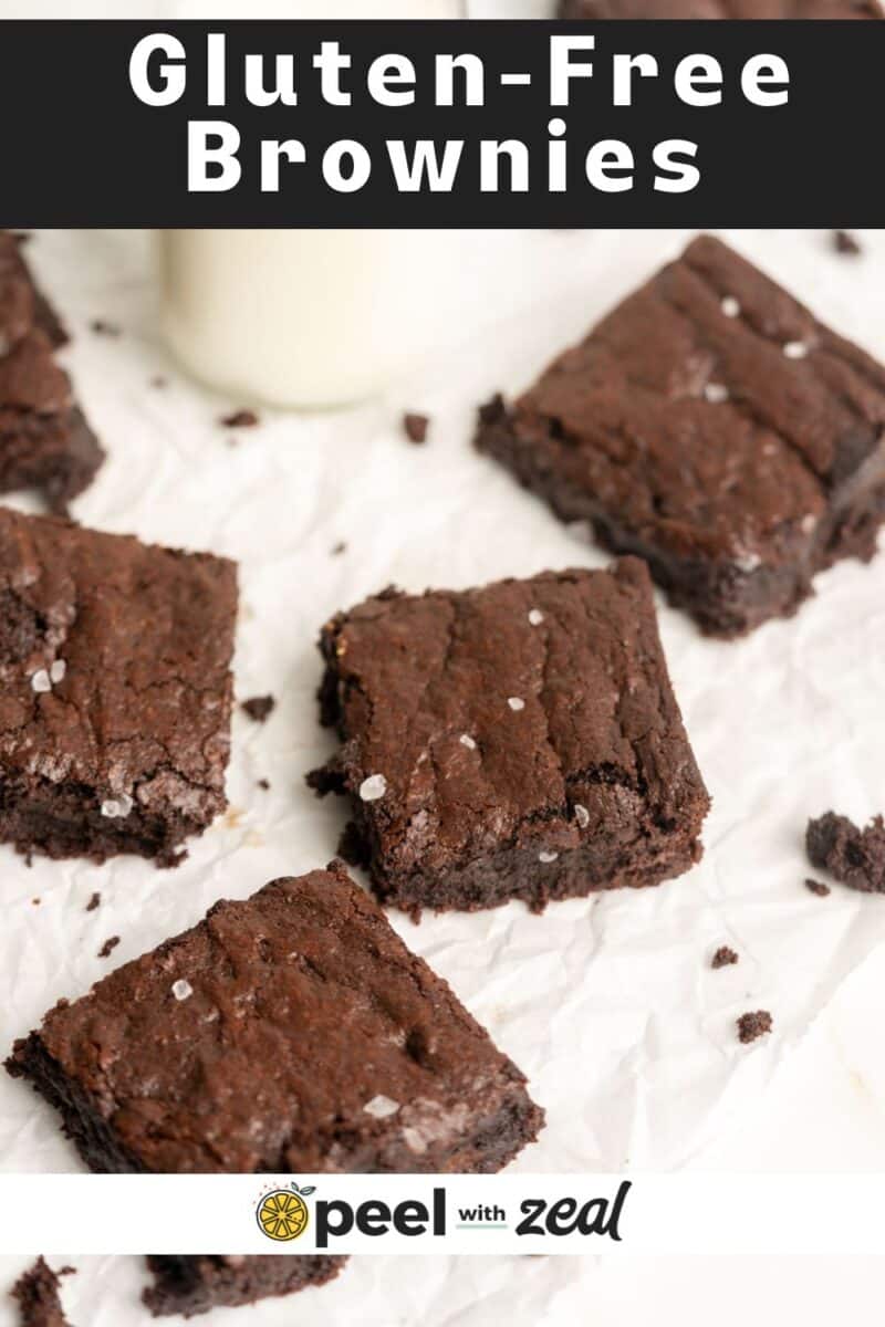 Gluten free brownies on white parchment paper.