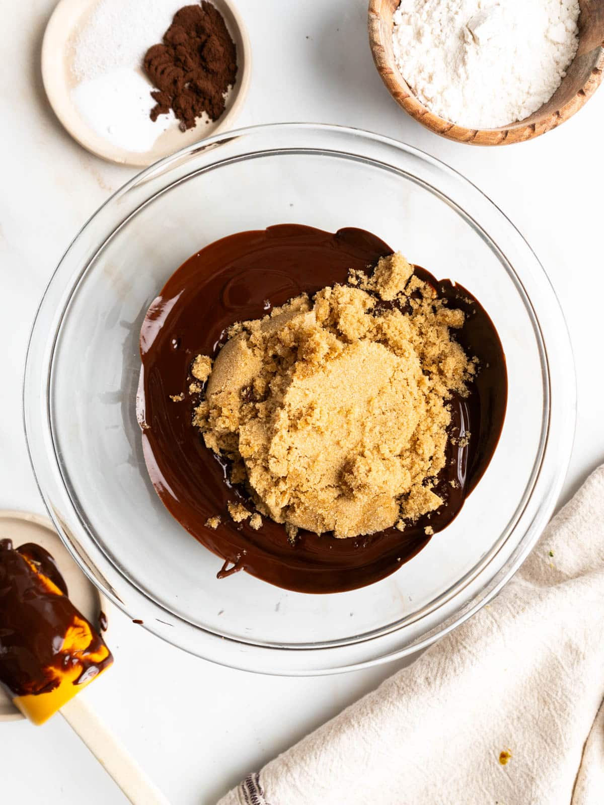 Brown sugar and chocolate in a mixing bowl.