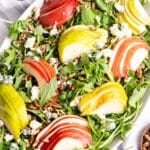 Pear salad with arugula and pecans.