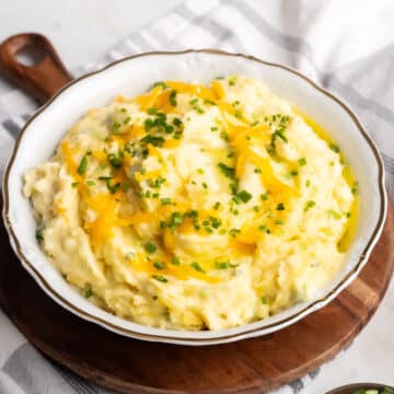Cheese mashed potatoes in a bowl.