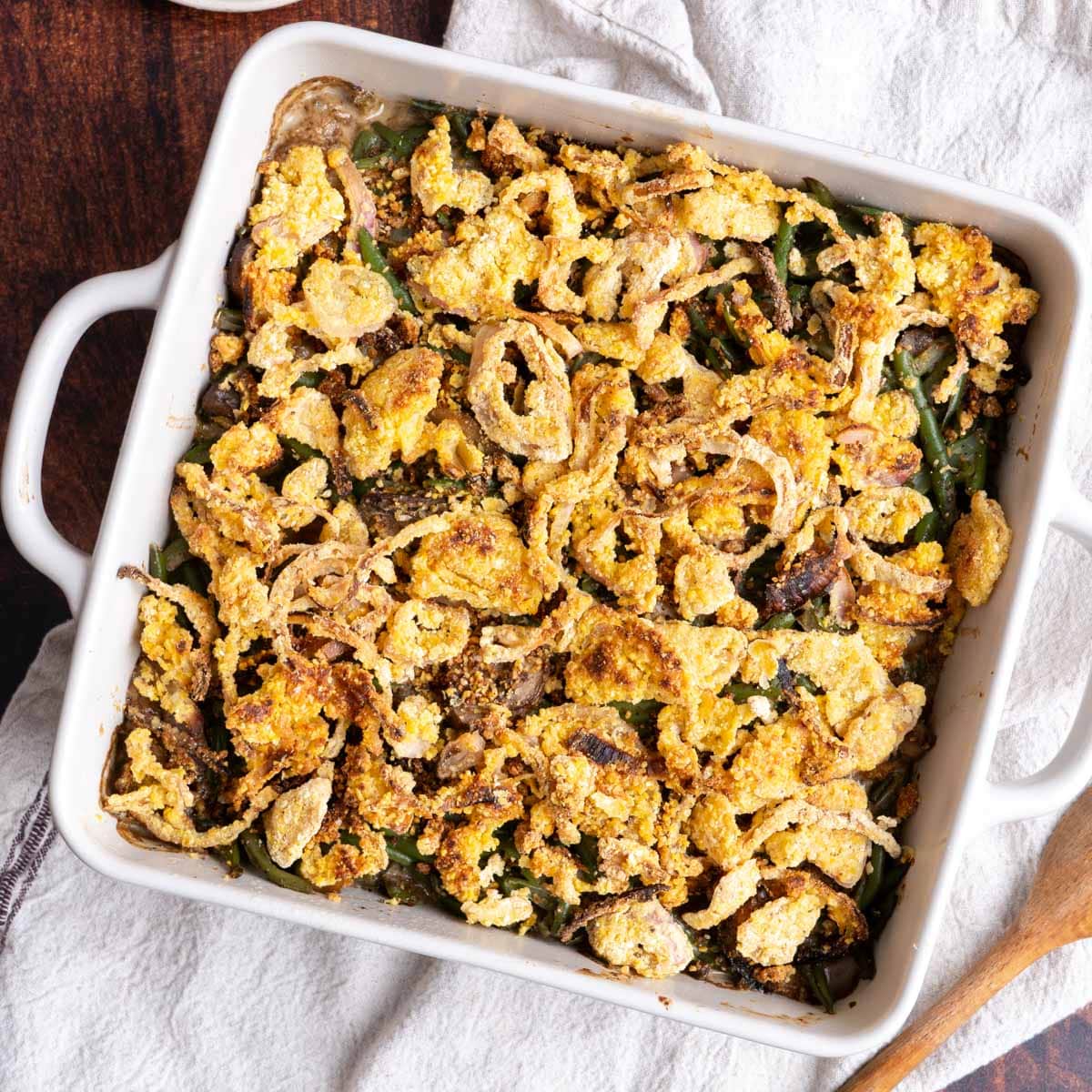 Green bean casserole in a white baking dish.