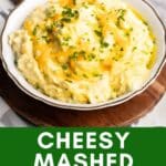 Mashed potatoes with cheese in a bowl.