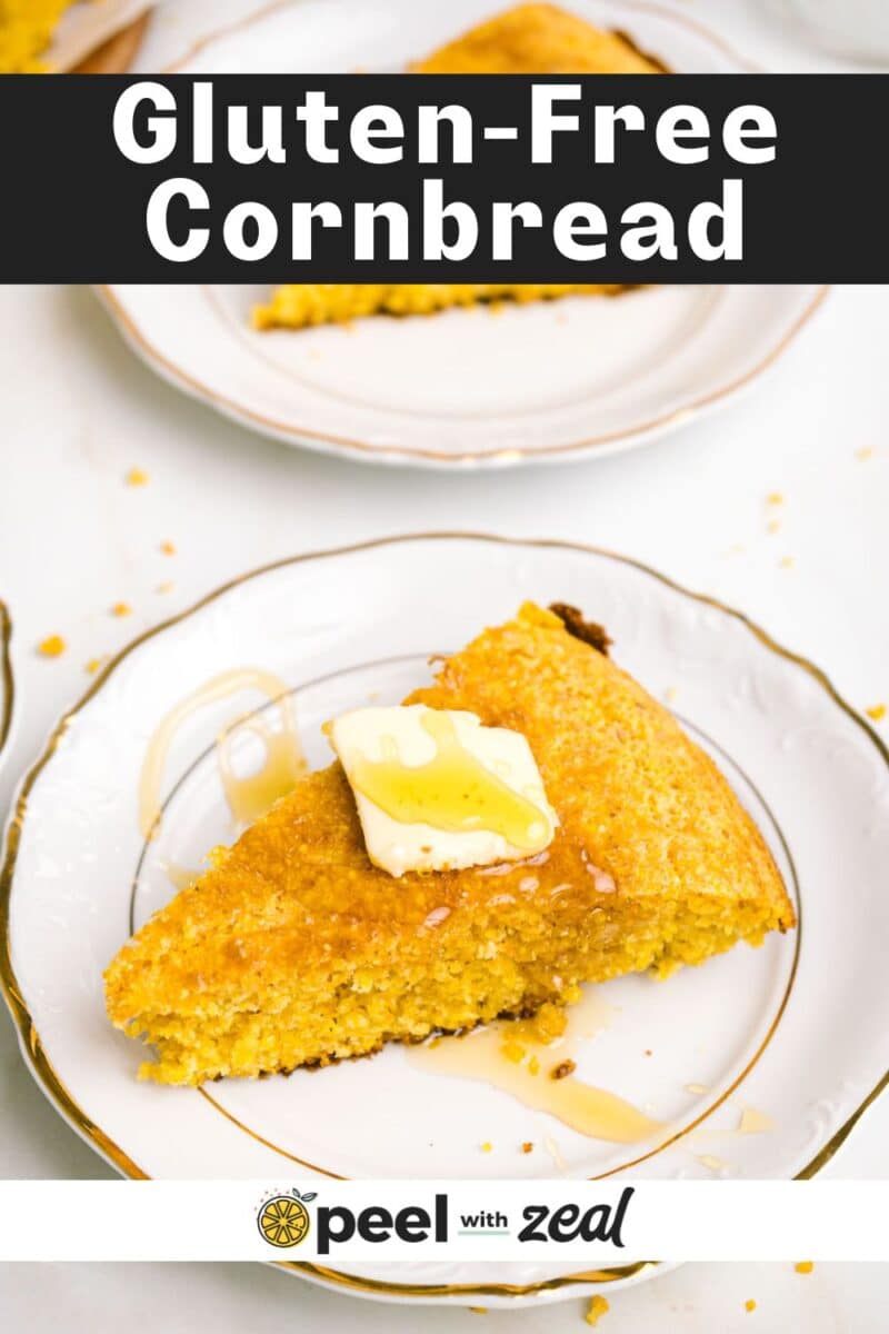 A slice of cornbread topped with butter.