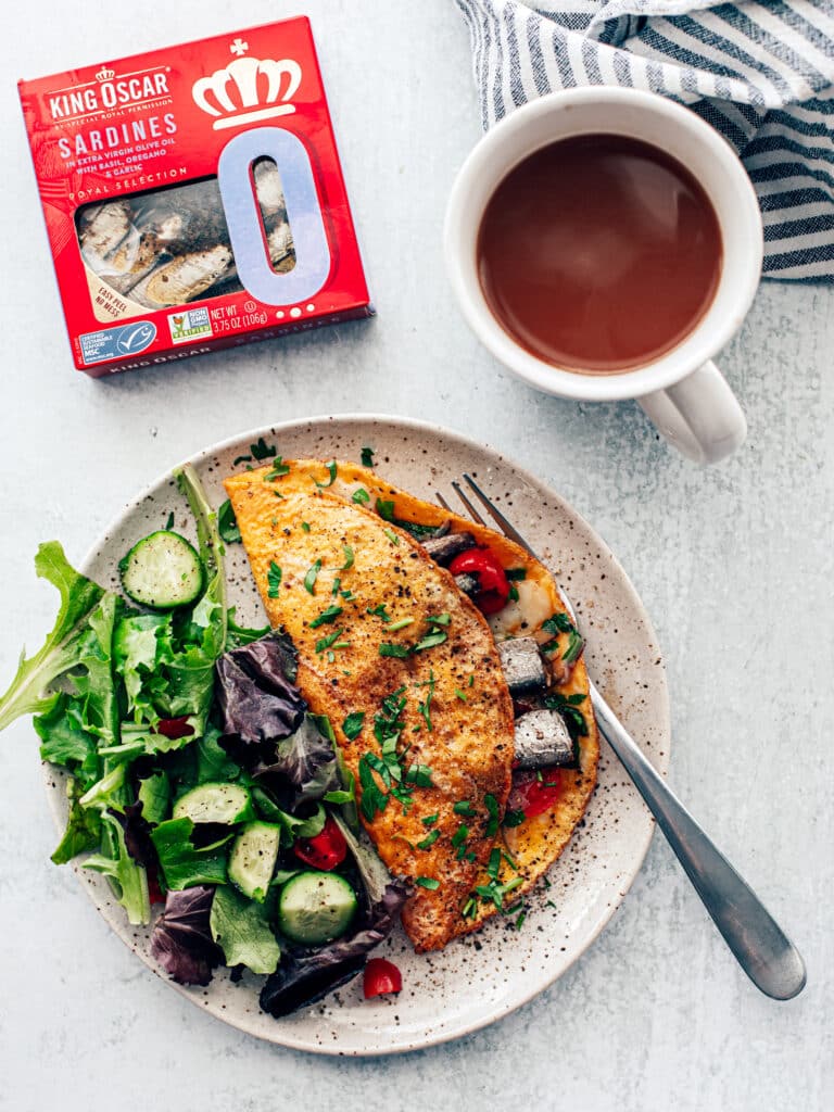 Brown butter omelet sardines with a side of salad.