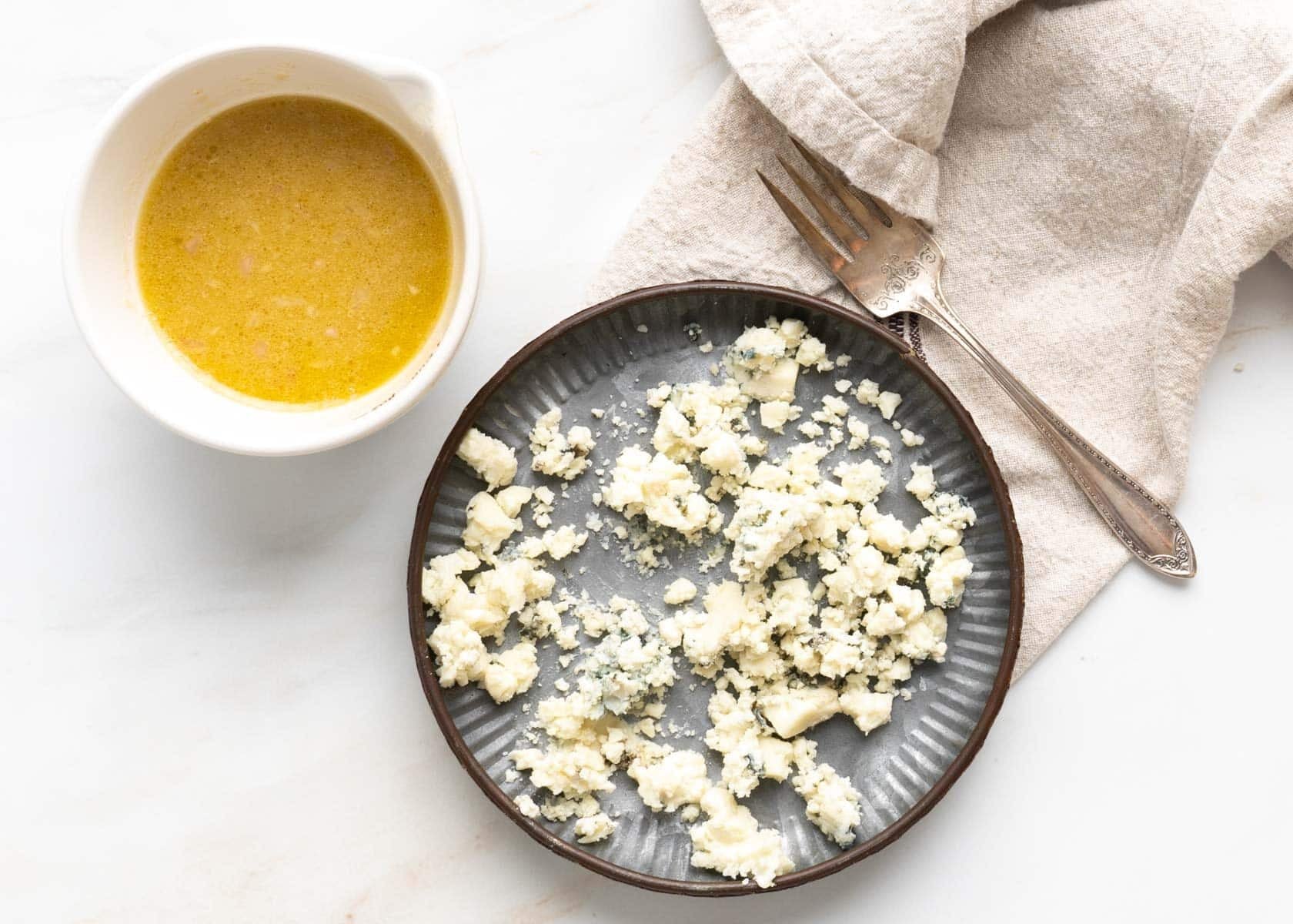 Crumbled cheese and dressing.