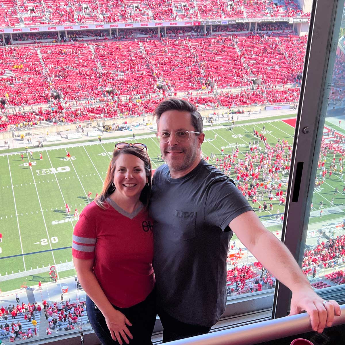 People at a football stadium.