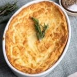 Potato souffle in a casserole dish.