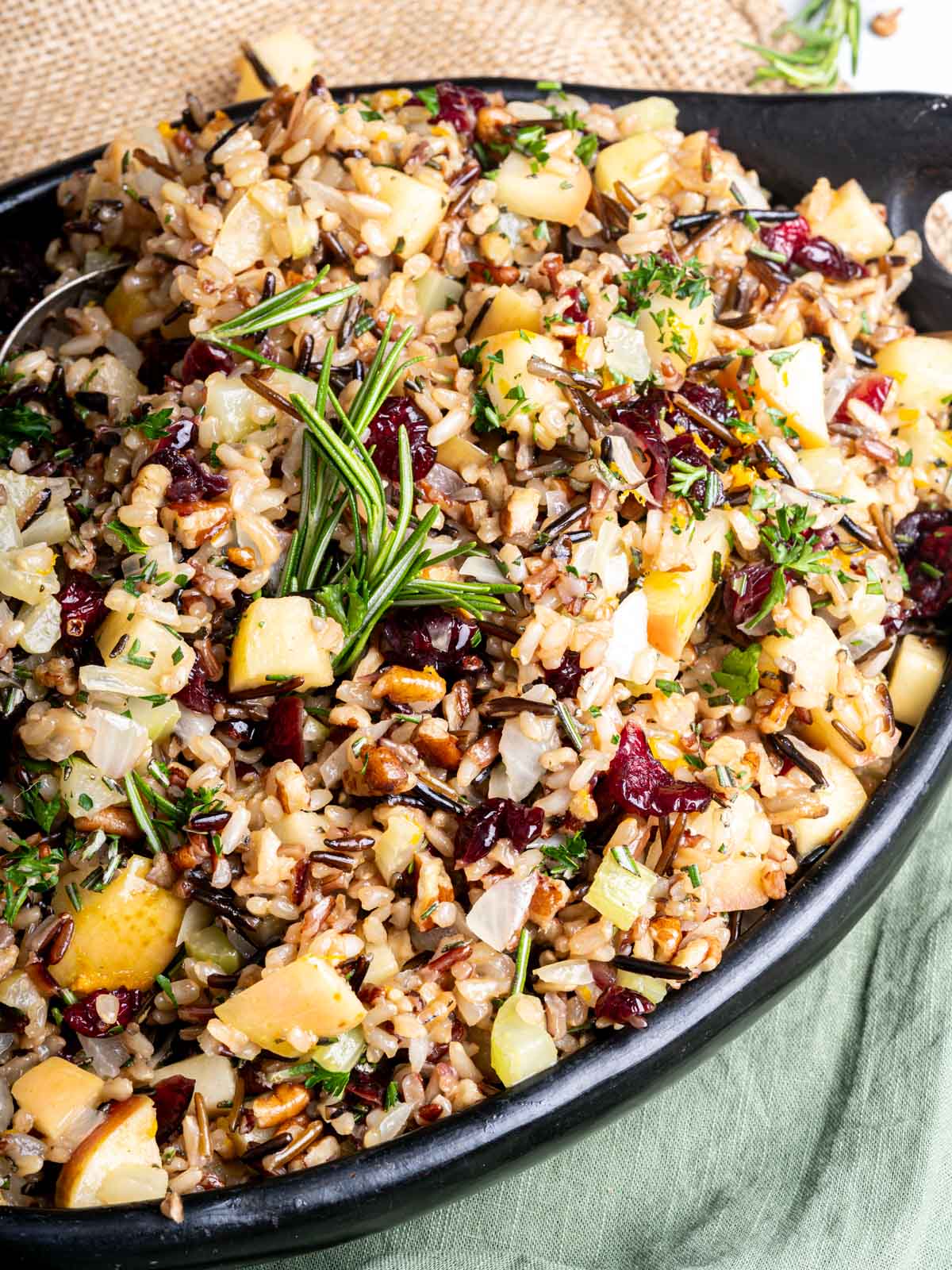 Thanksgiving rice topped with rosemary.