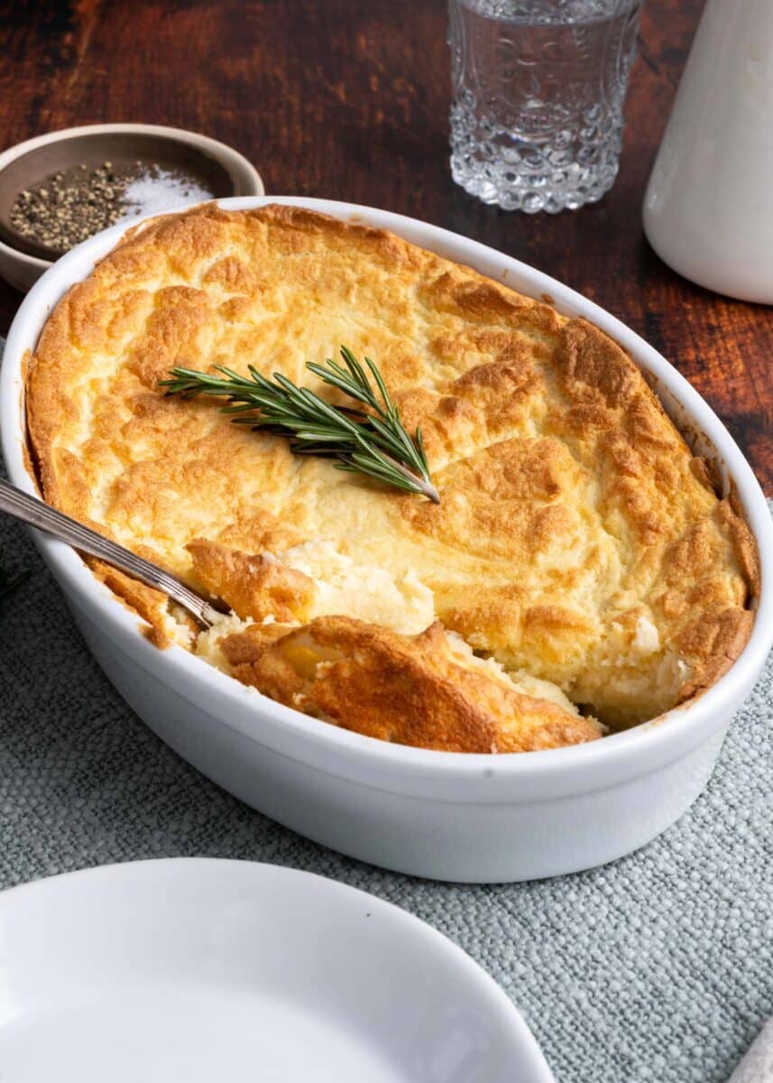 Potato souffle in a casserole dish.