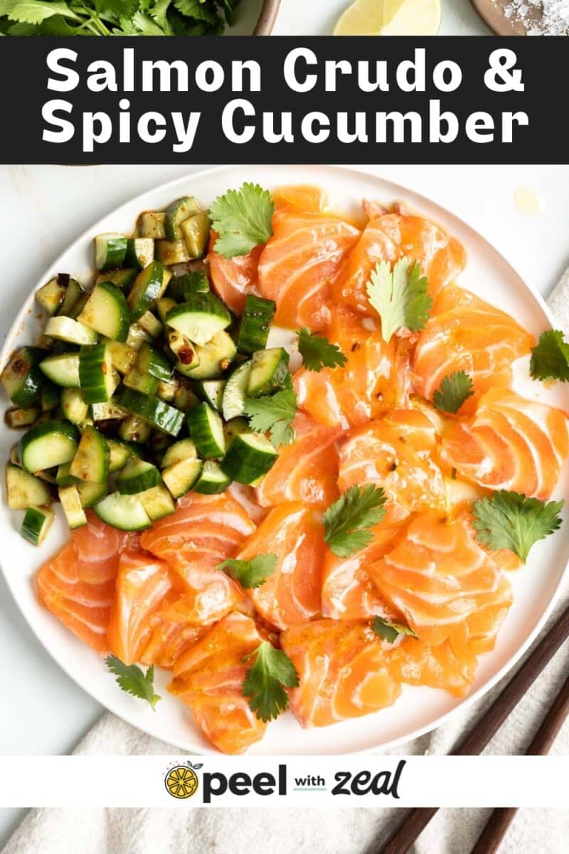 Salmon Crudo with a side of cucumber slices.