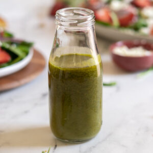 Basil balsamic vinaigrette in a bottle.