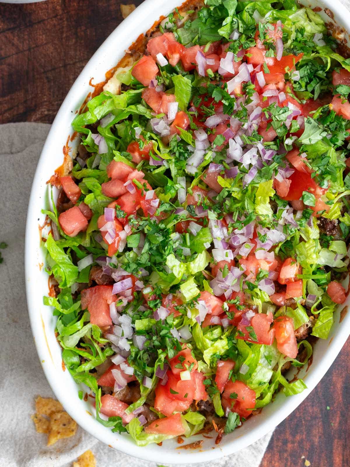 Hamburger taco dip on a baking dish.