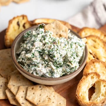 Spinach artichoke dip in a bowl.