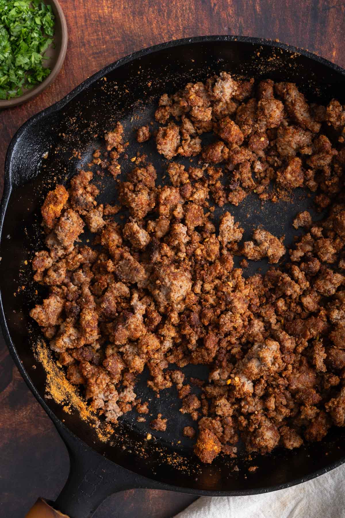 Cooked taco meat in a skillet.