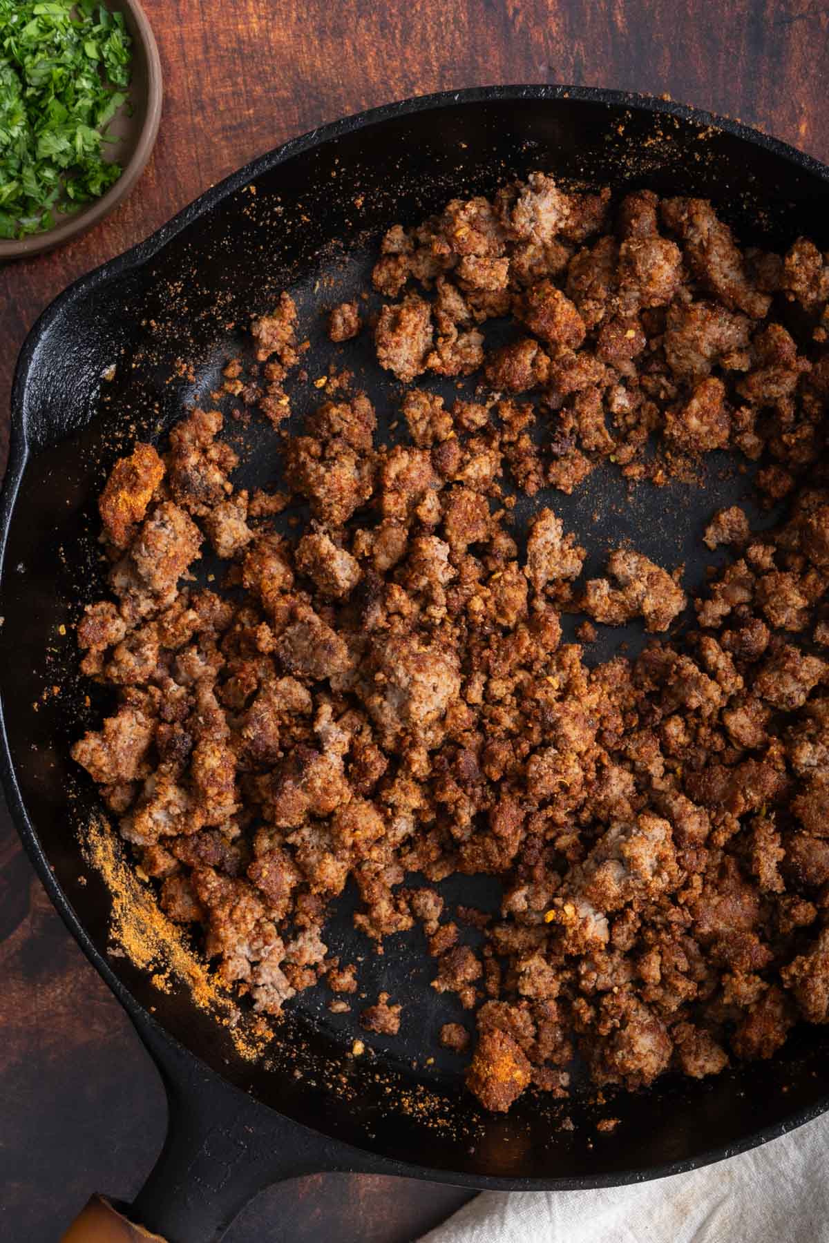 Cooked taco meat in a skillet.
