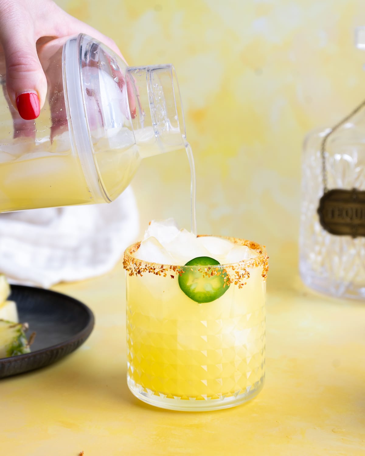 Pineapple margarita in a glass.