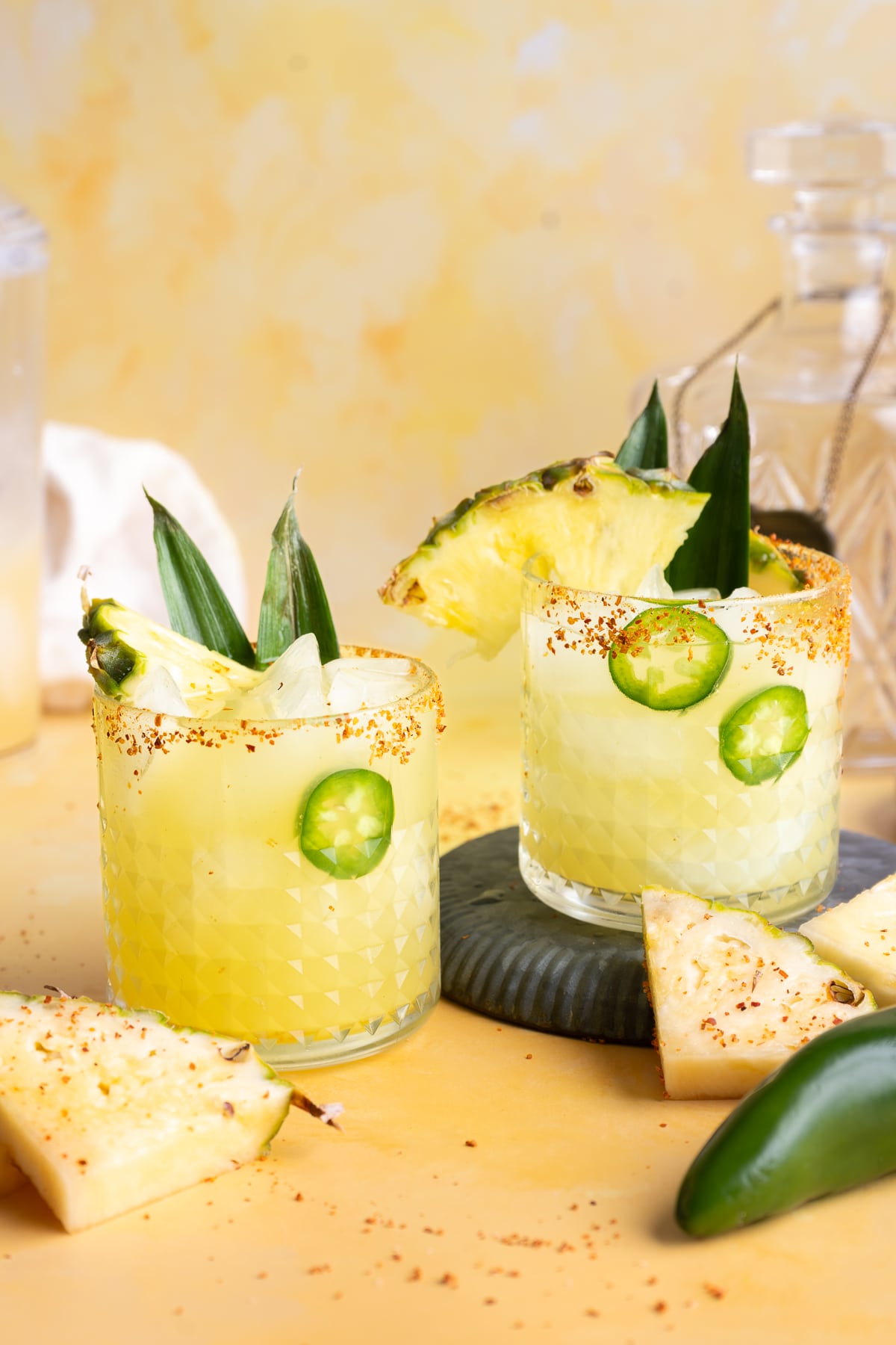 Two glasses of pineapple margarita cocktail.