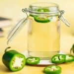 Simple jalapeno syrup in a jar.