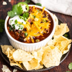 Black bean and turkey chili in a bow with chips.