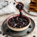 Blueberry pancake syrup in a bowl.
