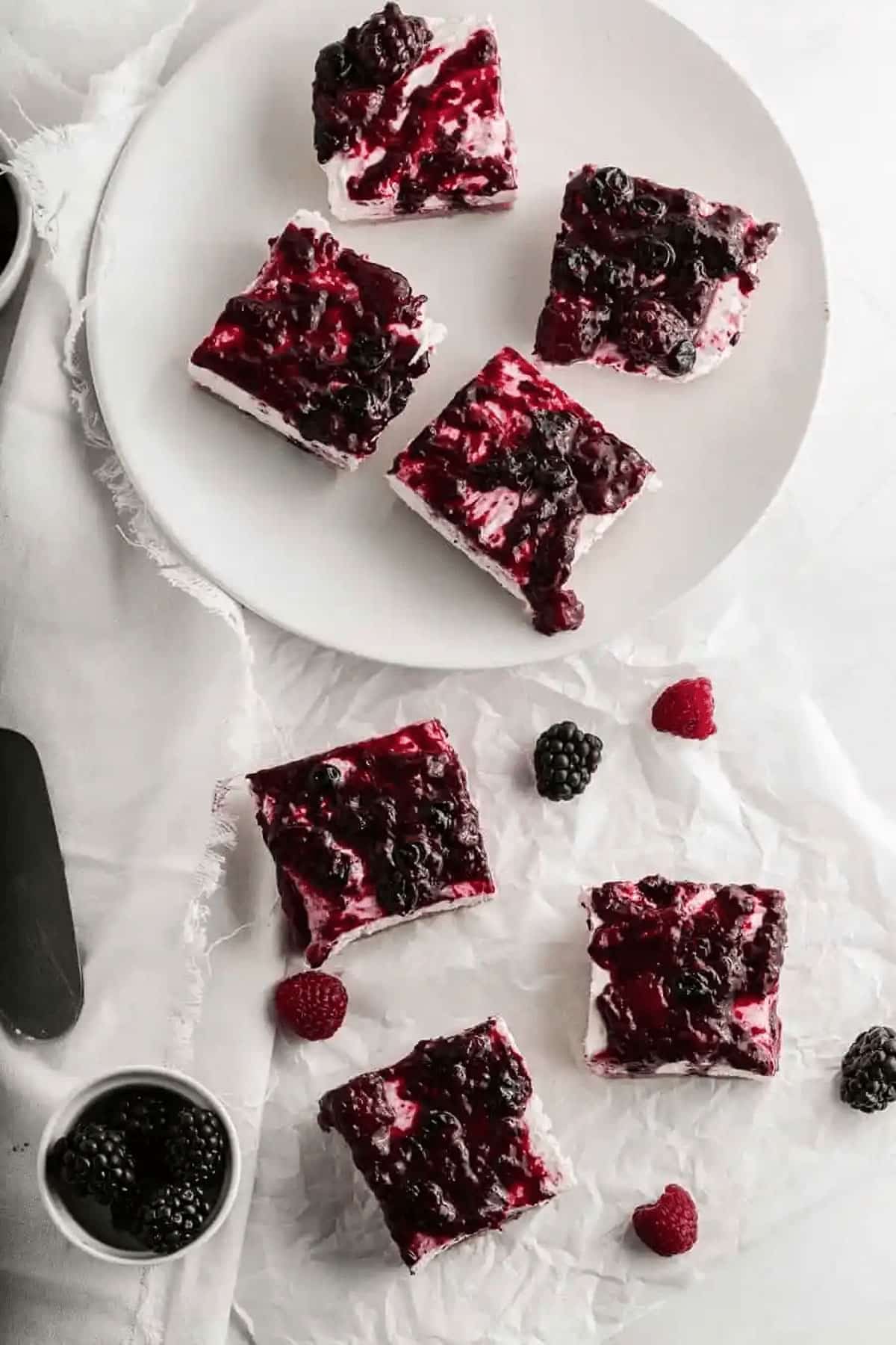 cheesecake bars with berries.