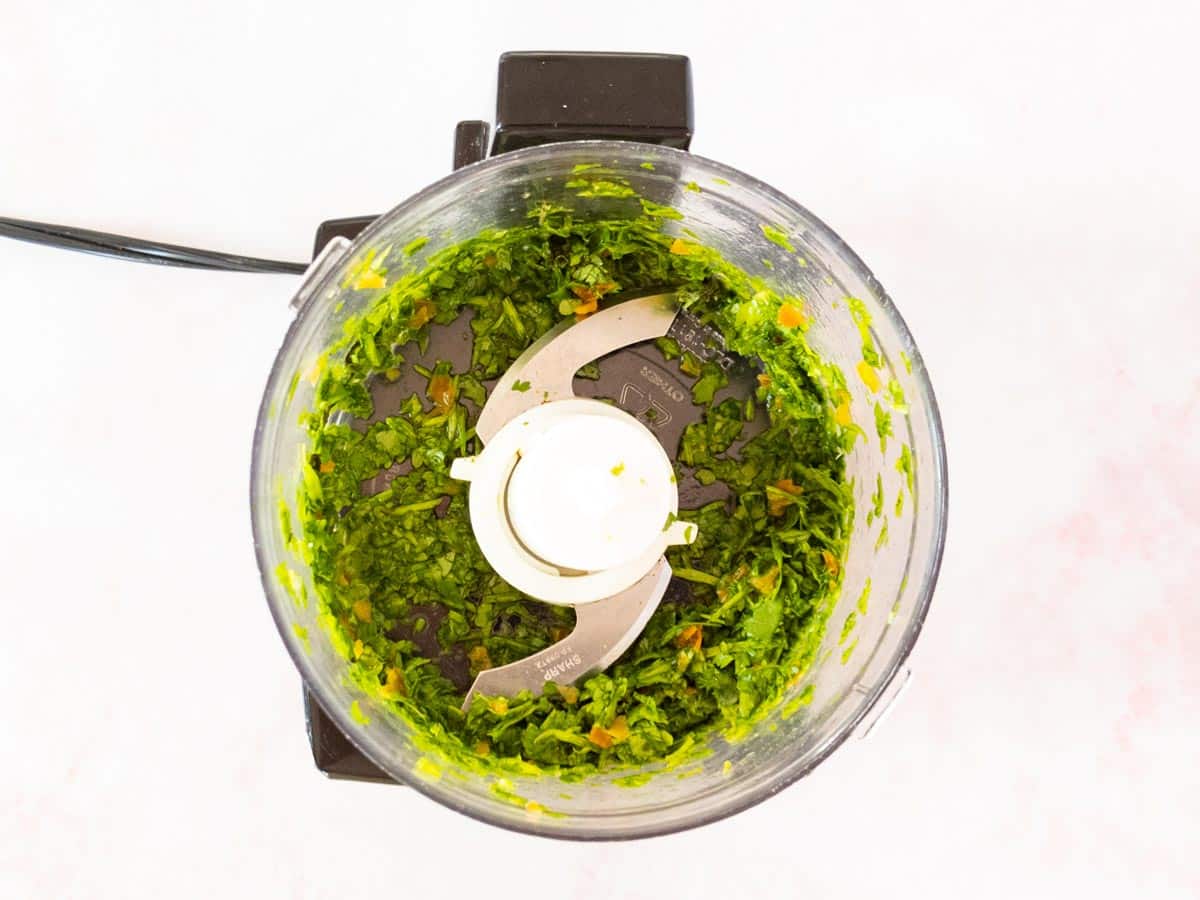 cilantro and pepper in food processor.