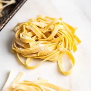 Gluten-free pasta sprinkled with flour.