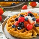 Gluten-free waffles with fruits on top.