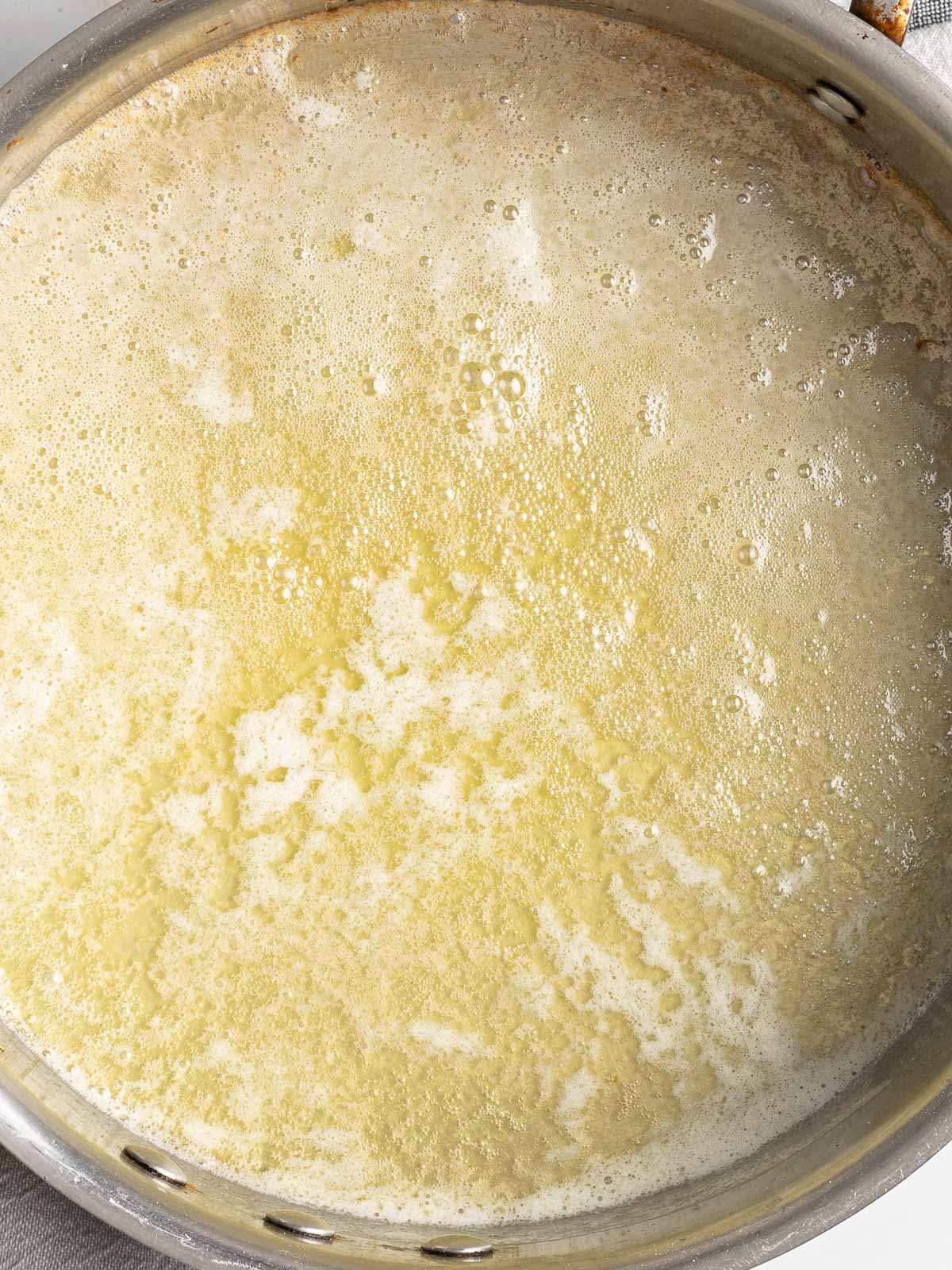 Butter foaming in saute pan. 