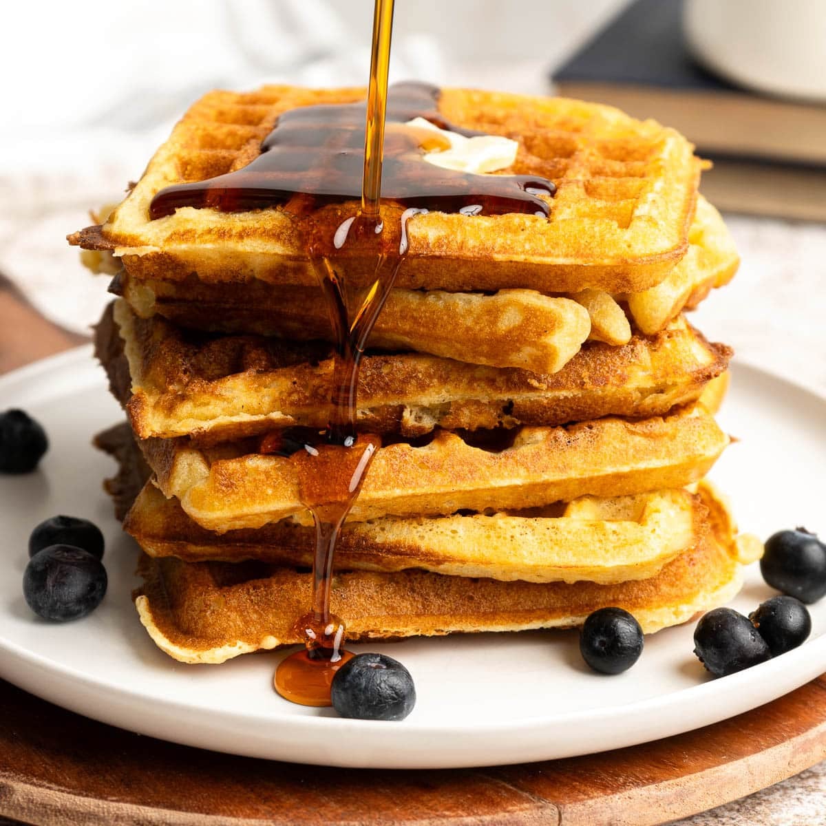 Stacked waffles with syrup
