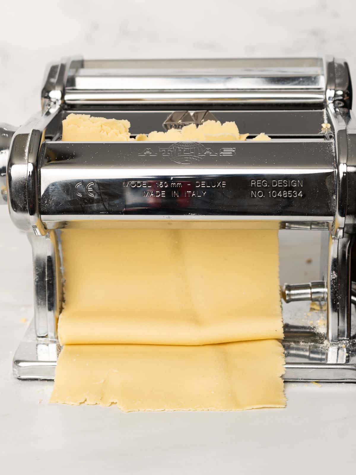 Pasta dough in the pasta maker machine.
