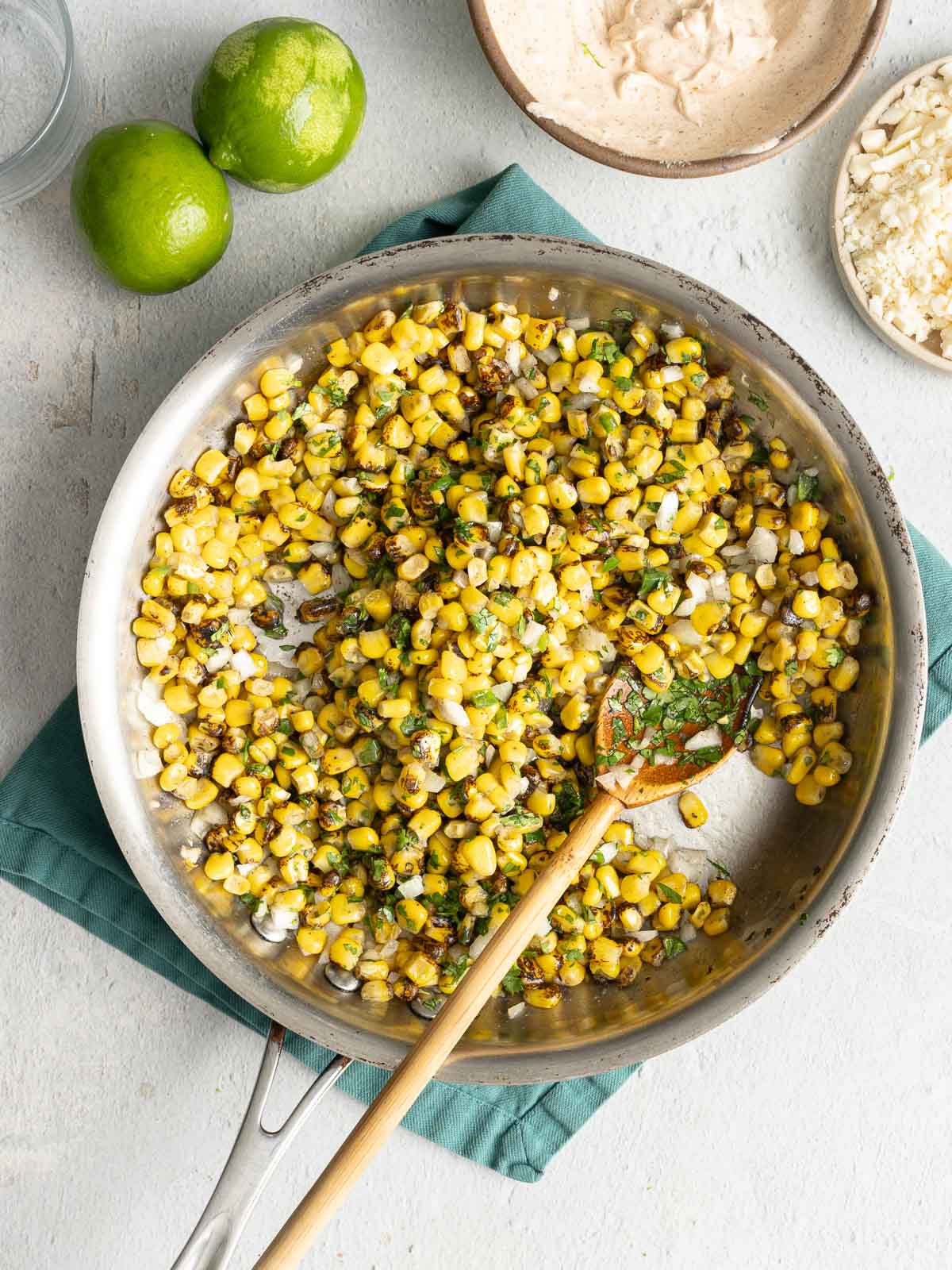 Elote corn in a pot.