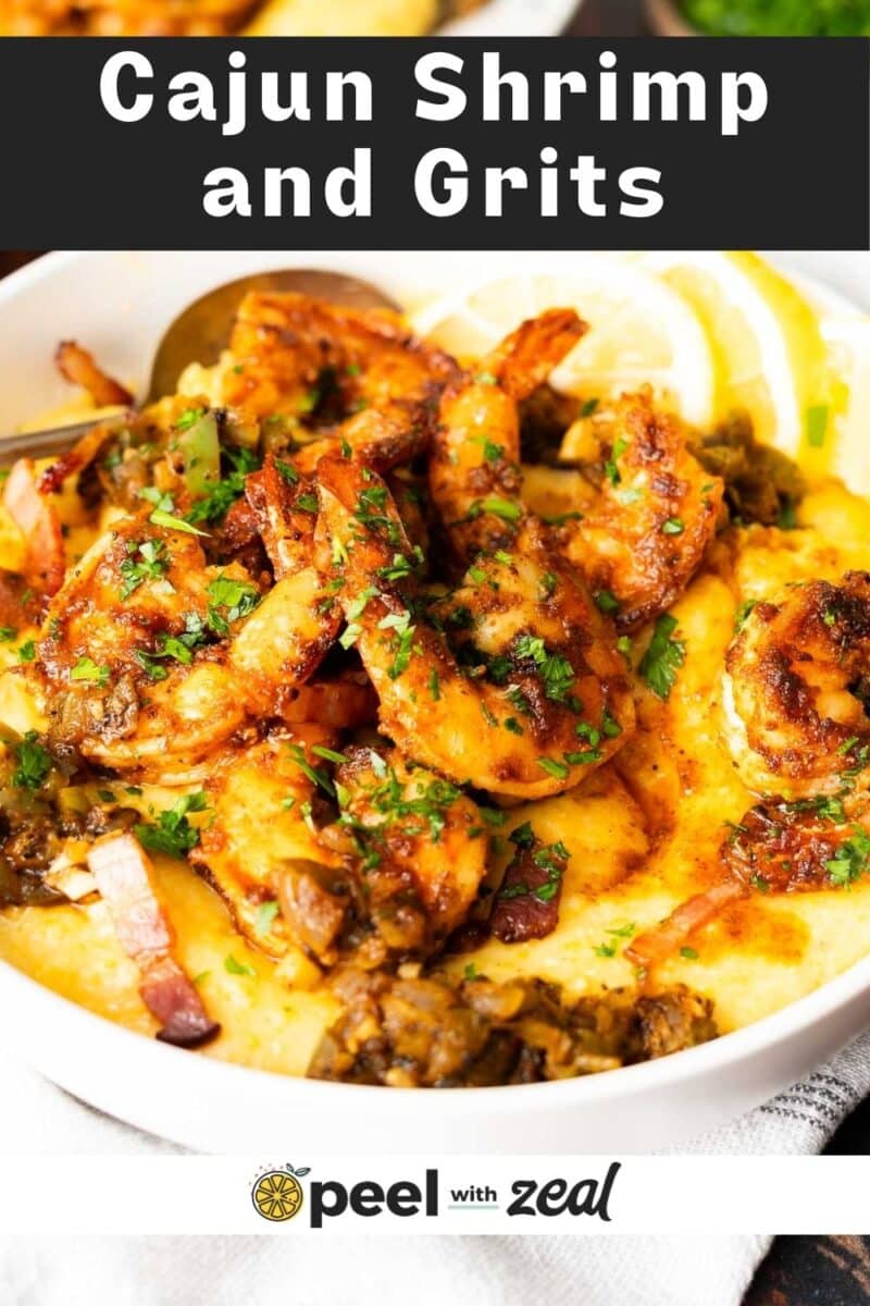Cajun shrimp and grits served in a dish.⁣⁣ ⁣⁣⁣⁣