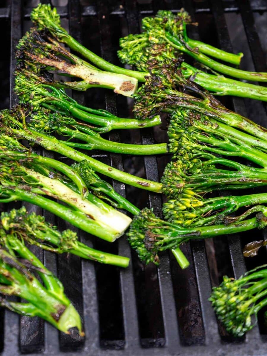 An array of broccolini roasted on the grill.