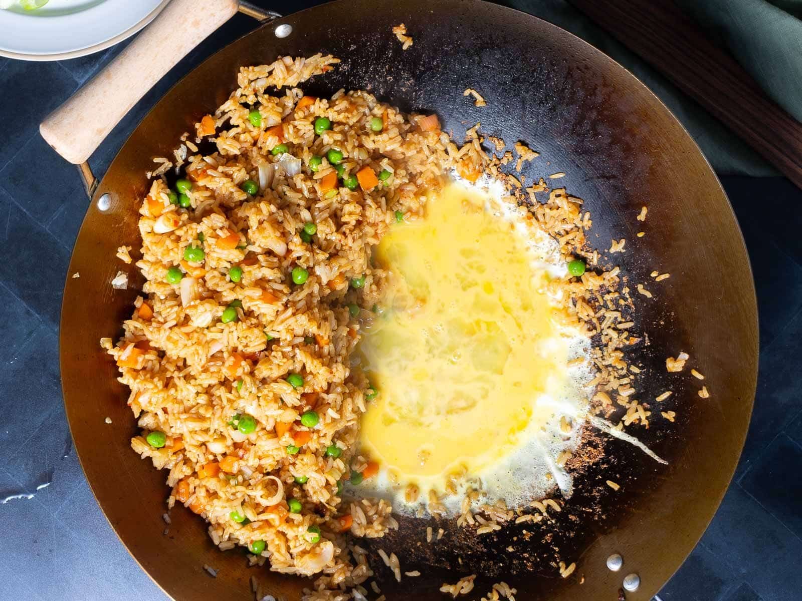 Shrimp chicken fried rice cooked in a wok.