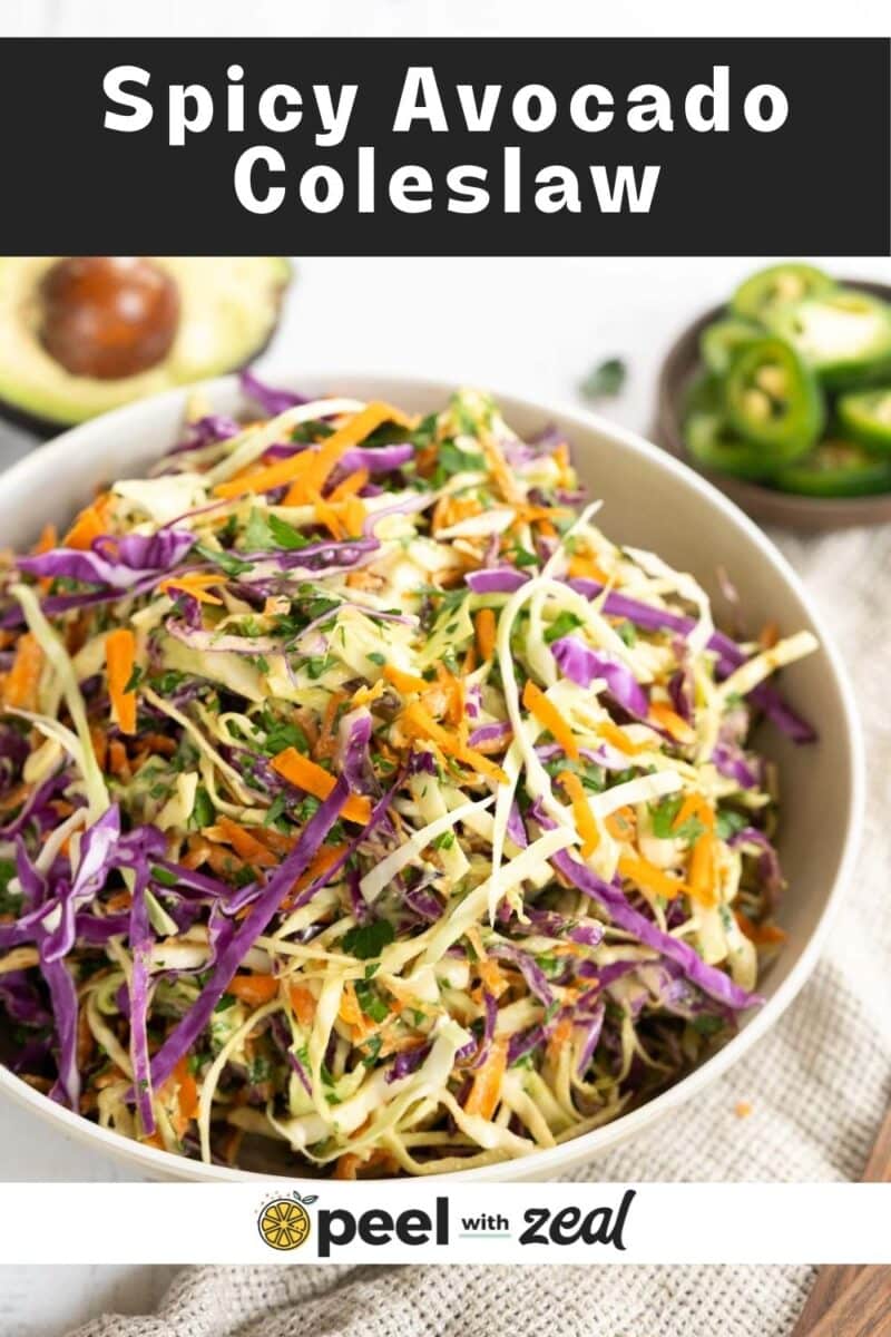 Spicy Avocado coleslaw in a salad bowl resting on the table.