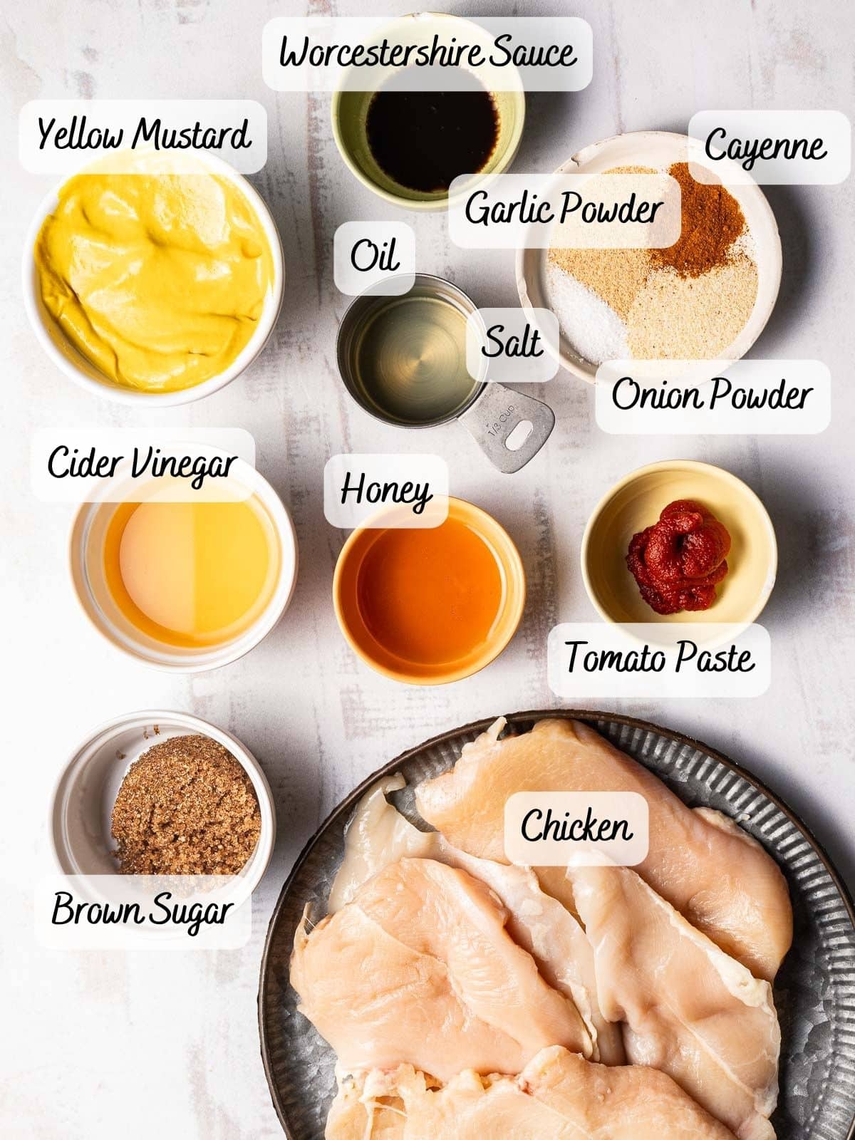 Showcasing key ingredients of Carolina barbeque chicken recipe displayed on the table.