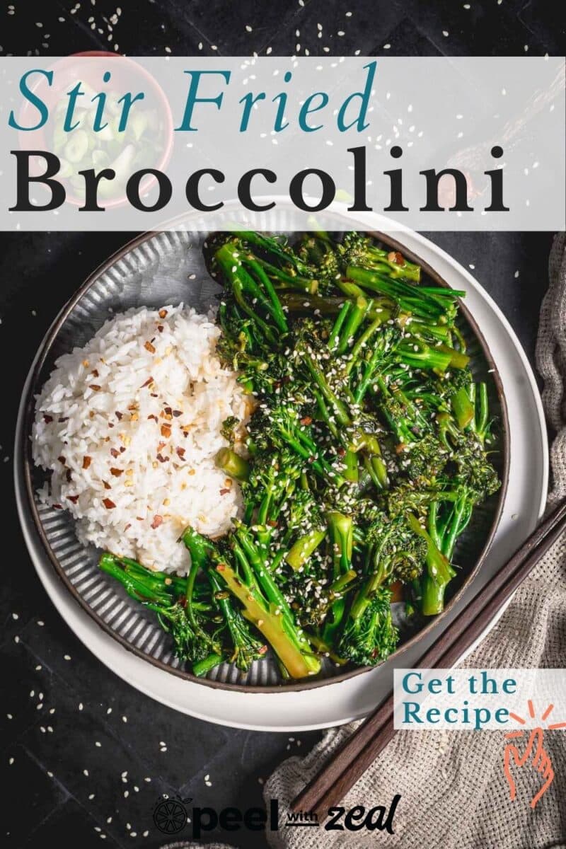 Stir fried broccolini with rice garnished with sesame seeds and some chili flakes.