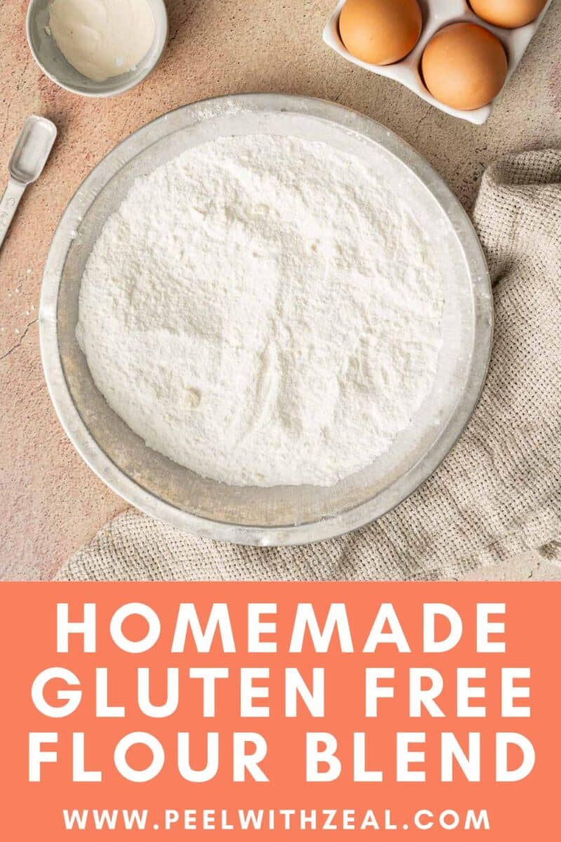 Gluten-free flour in the mixing bowl and eggs on the side on the countertop.