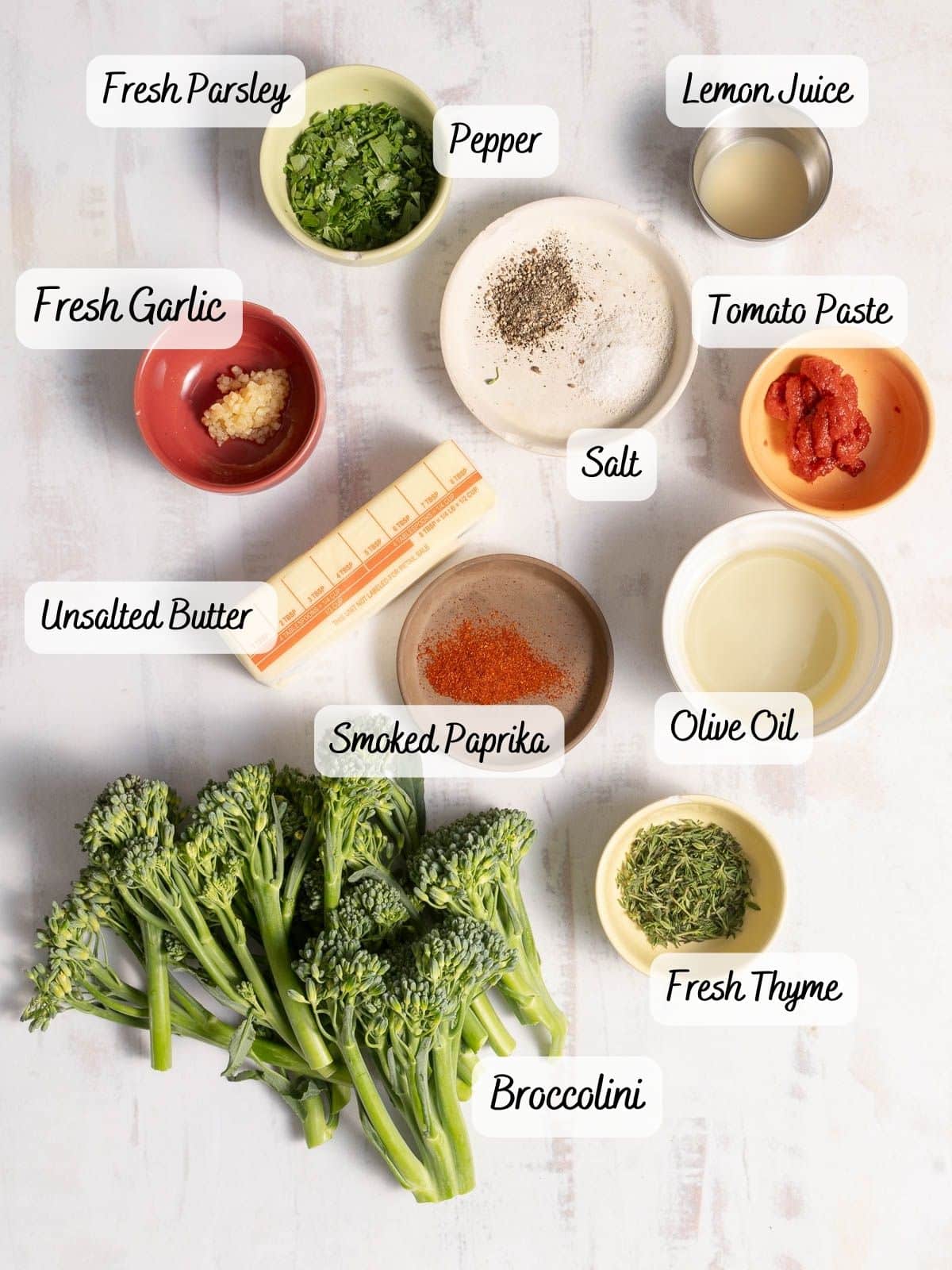 Showcasing broccolini ingredients displayed on the countertop.