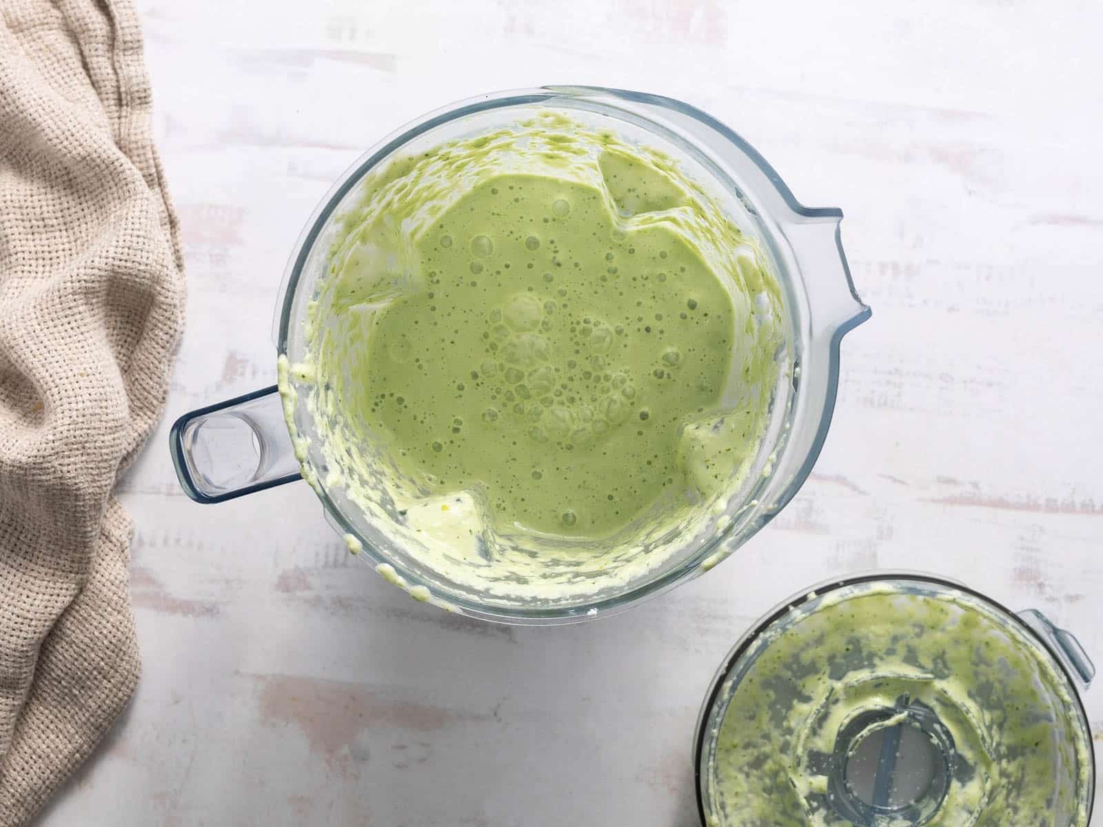 Chilled cucumber in a food processor resting on the table.