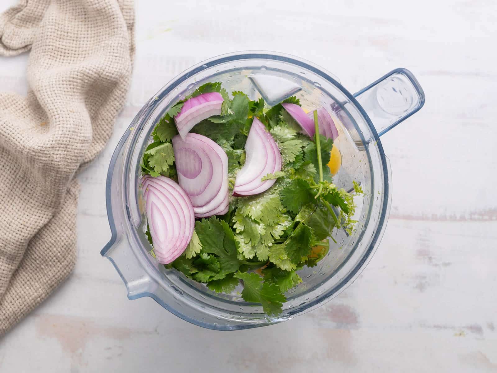 Cucumber Gazpacho ingredients place inside the food processor.