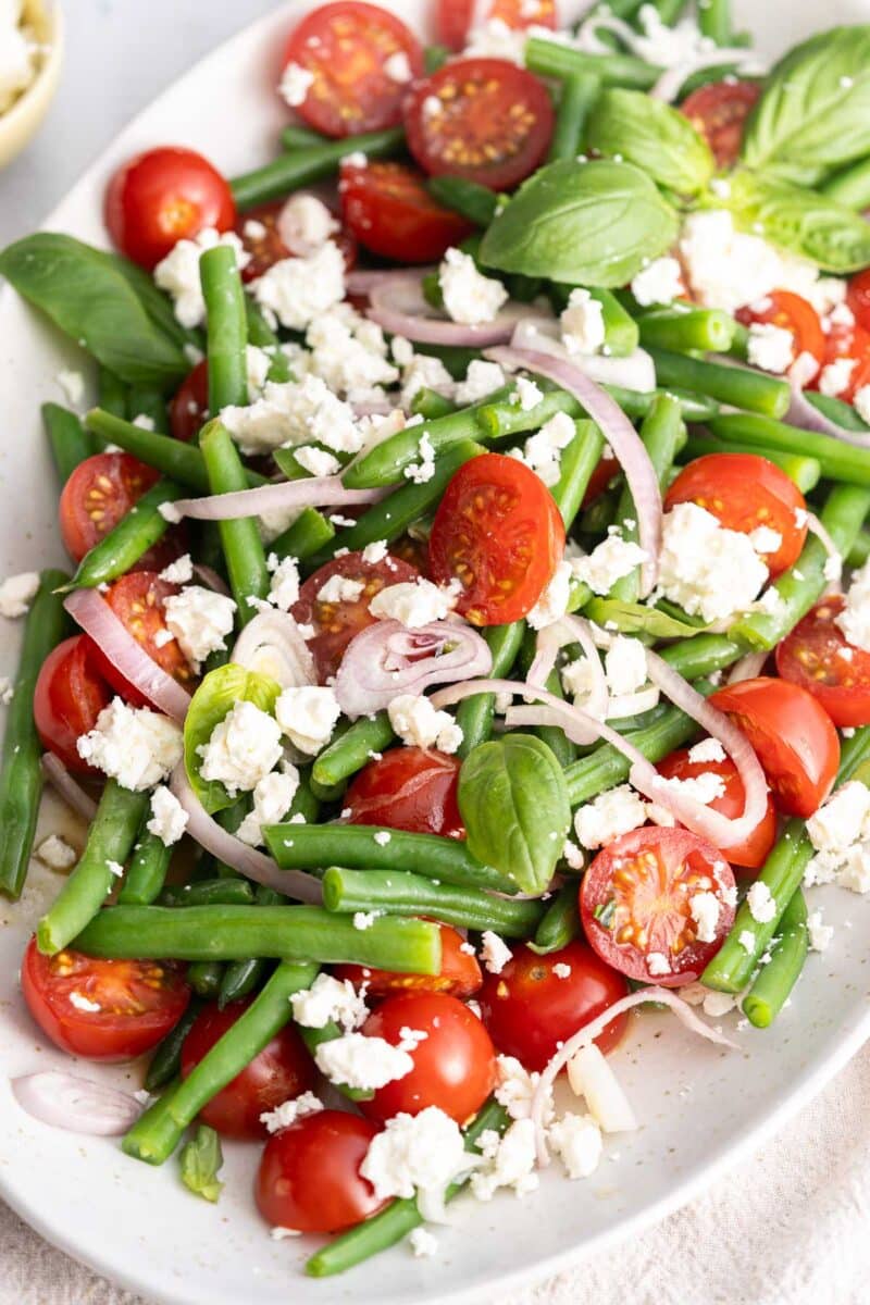 Feta green bean salad in an oval shape platter.