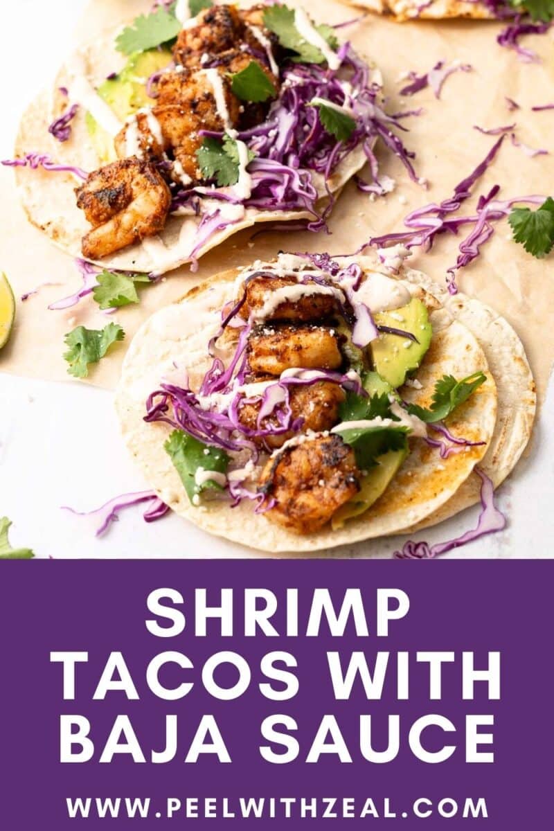 Shrimp tacos drizzled with Baja sauce served on the table.