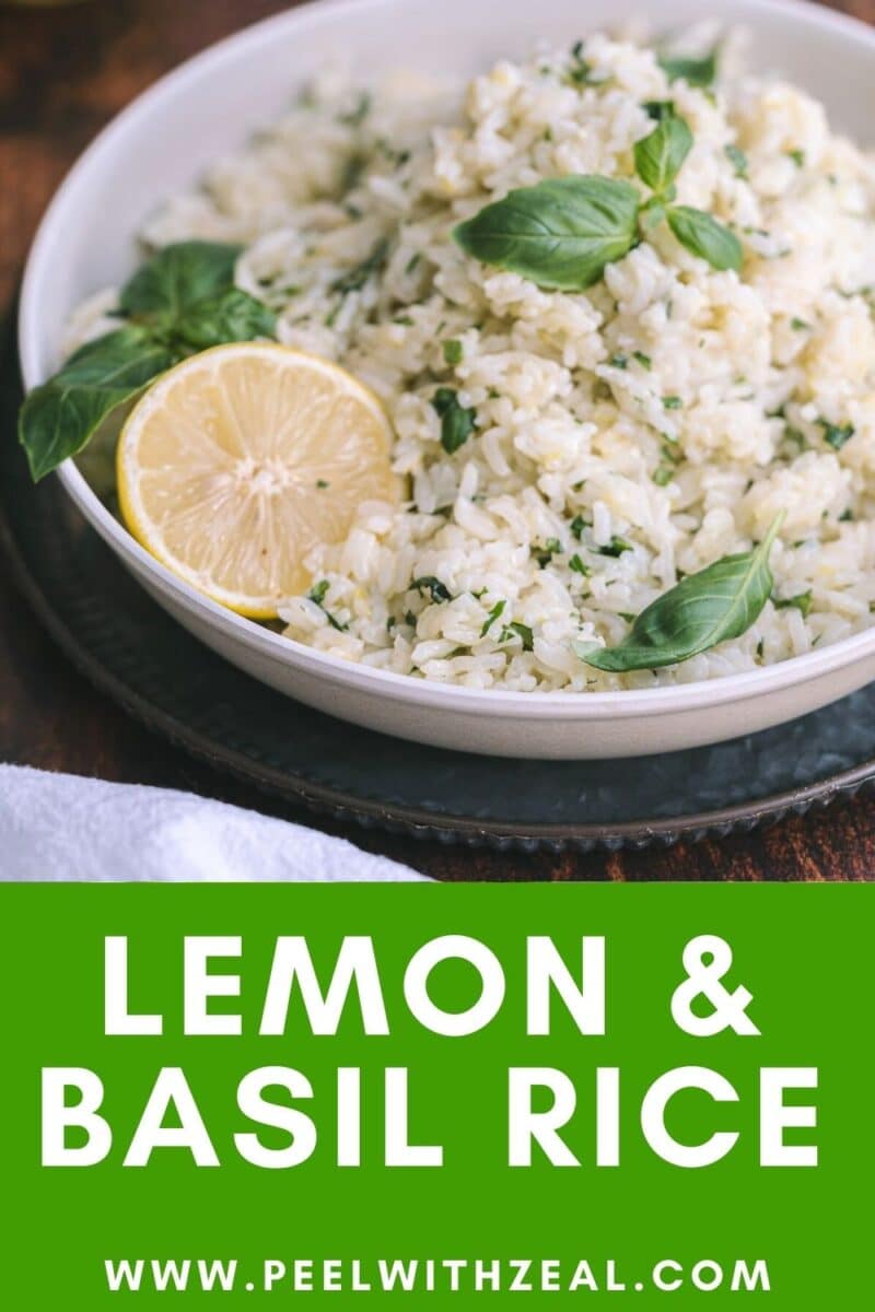 Lemon basil rice served on the shallow platter atop a platter resting on the table.