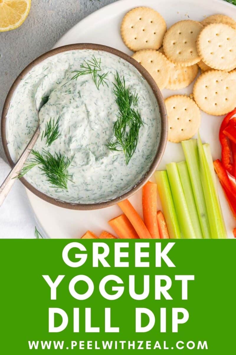 Greek yogurt dill sauce with crackers on the side, carrot batons, sprigs and slices of bell peppers.