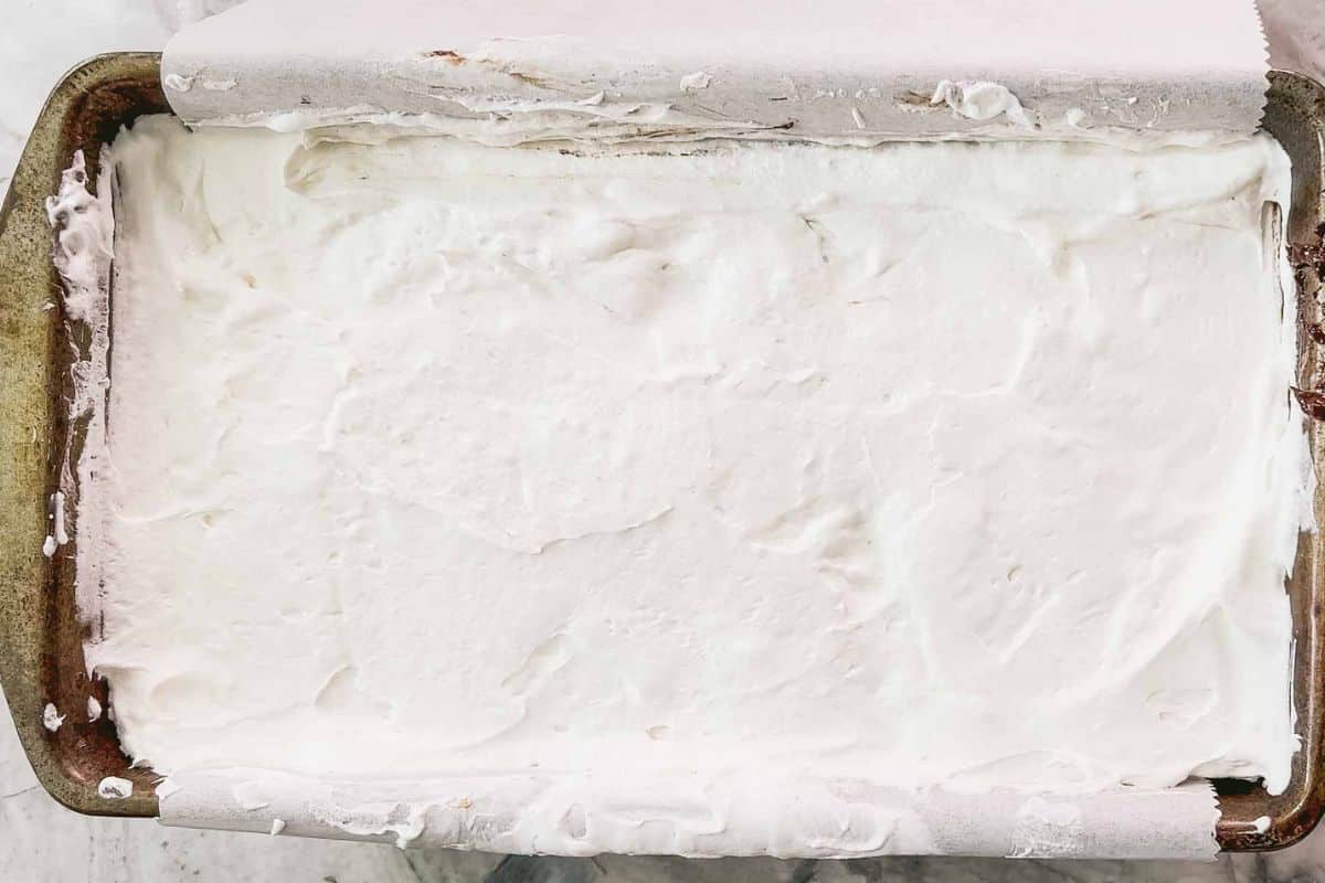 Melted marshmallows in a baking sheet pan.